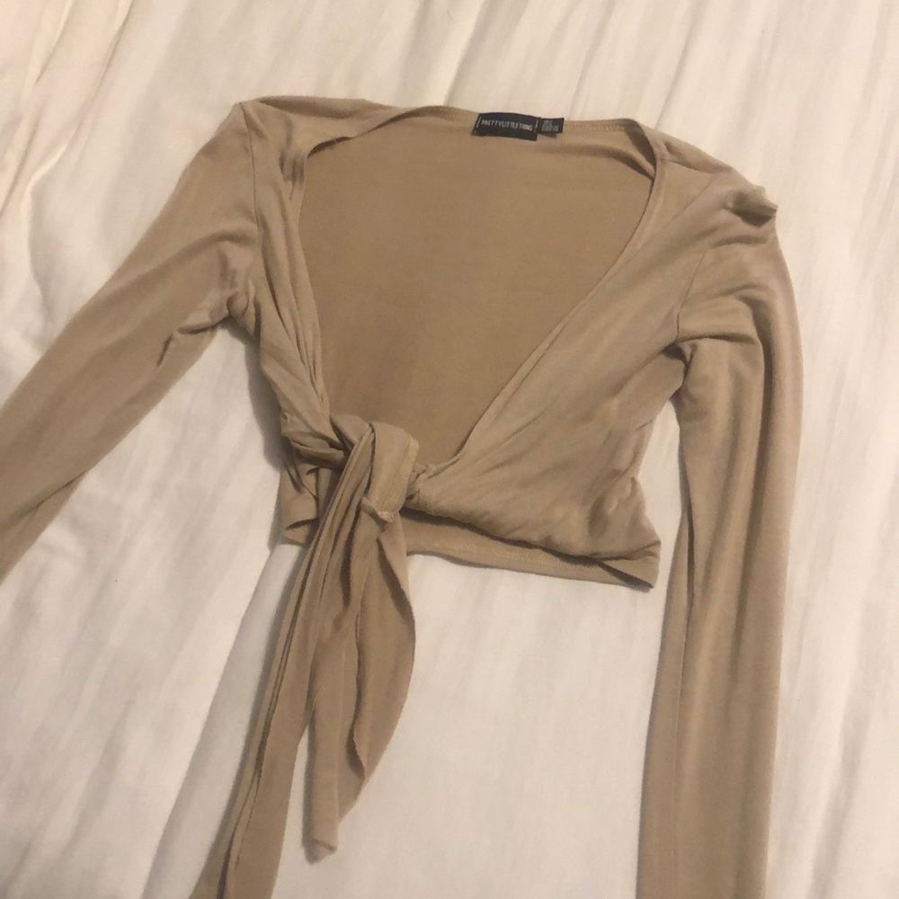 nude crop top